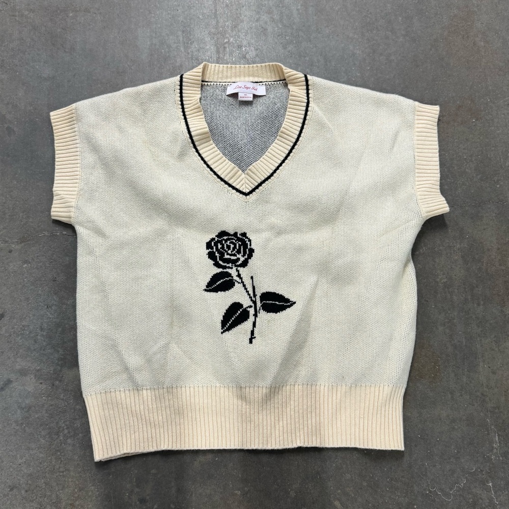 Lisa Says Gah Cream and Black Sweater Vest